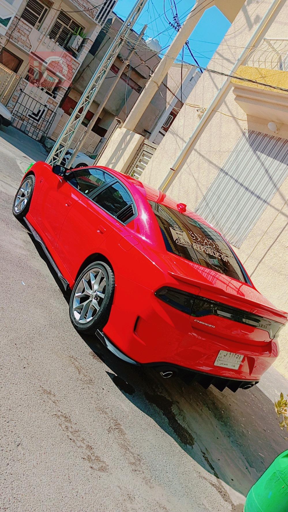 دۆج چارجەر